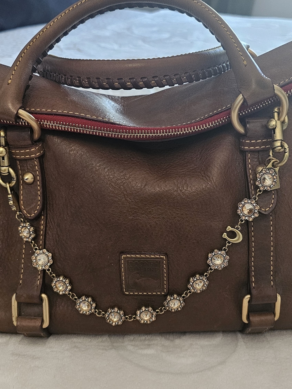 Dooney & Bourke Brown Leather Satchel with Decorative Chain